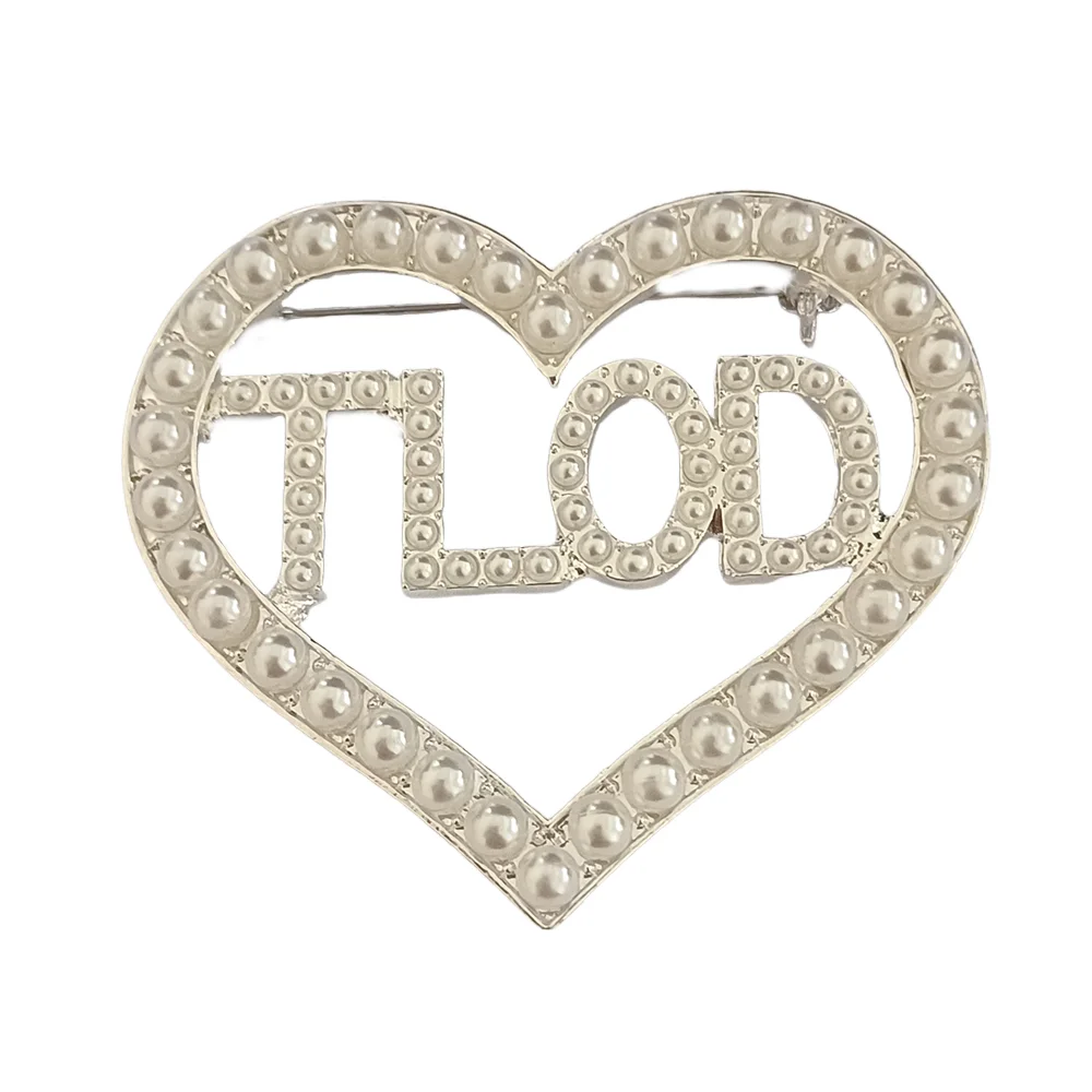

Metal inlaid pearl heart shaped Greek club letter TLOD brooch women's jewelry
