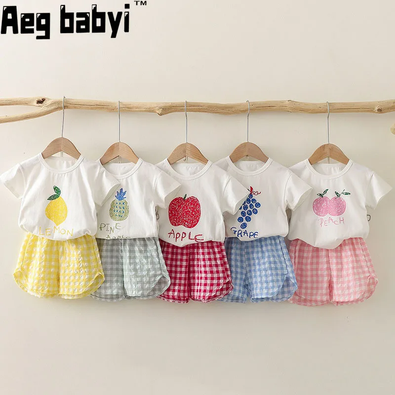 Summer New Baby Fruit Print Clothes Set Infant Girls Short Sleeve T Shirt + Plaid Shorts 2pcs Outfits Kids Boys Suit 1-5Y
Summer New Baby Fruit Print Clothes Set Infant Girls Short Sleeve T Shirt + Plaid Shorts 2pcs Outfits Kids Boys Suit 1-5Y