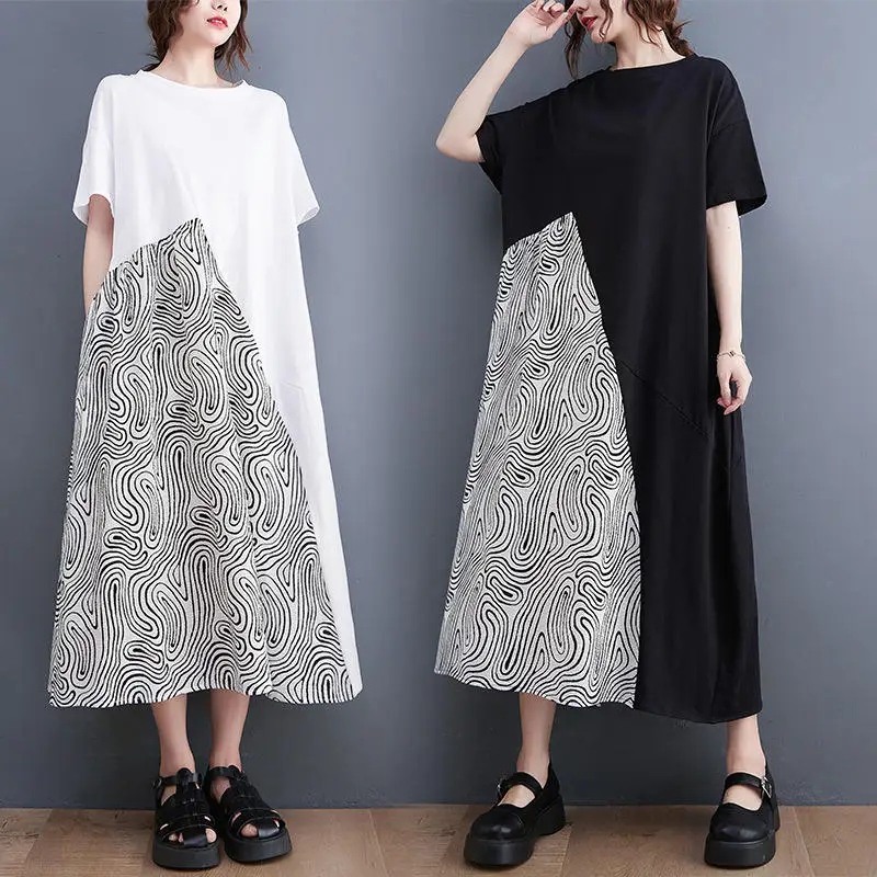 Summer new loose large size stripe splicing short sleeve temperament round collar in long dress
Summer new loose large size stripe splicing short sleeve temperament round collar in long dress