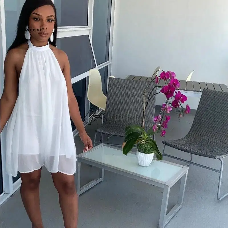 Женский шифоновый комбинезон с лямкой на шее, белый пикантный Свободный комбинезон с открытыми плечами и открытой спиной для отпуска, лето 2022 
Женский шифоновый комбинезон с лямкой на шее, белый пикантный Свободный комбинезон с открытыми плечами и открытой спиной для отпуска, лето 2022