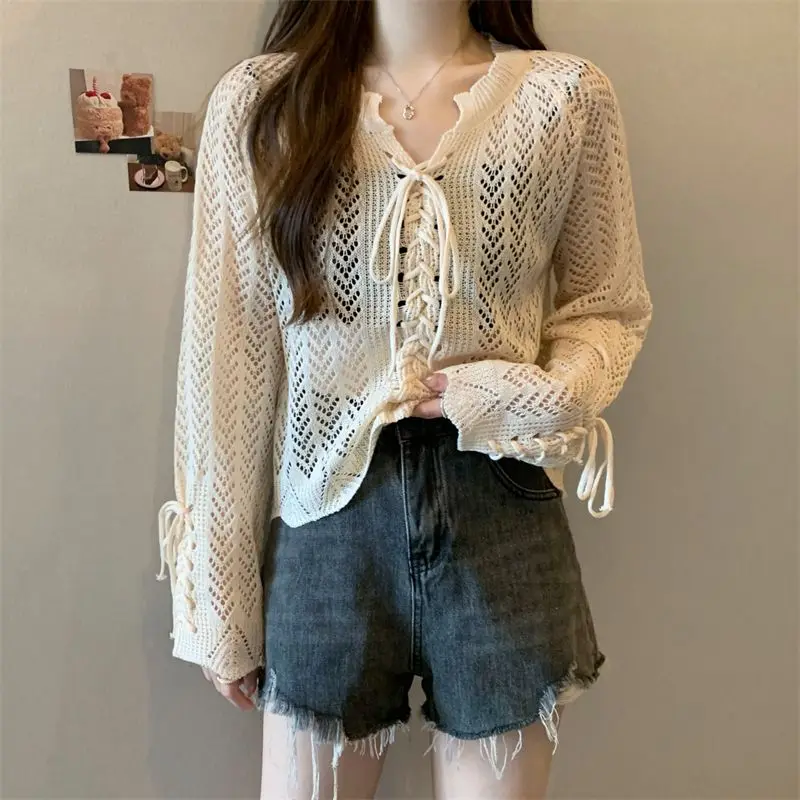 Summer New Knitted Cardigan Women Korean Loose V-neck Long Sleeve Hollow Bandage Cardigans Jacket Female
Summer New Knitted Cardigan Women Korean Loose V-neck Long Sleeve Hollow Bandage Cardigans Jacket Female