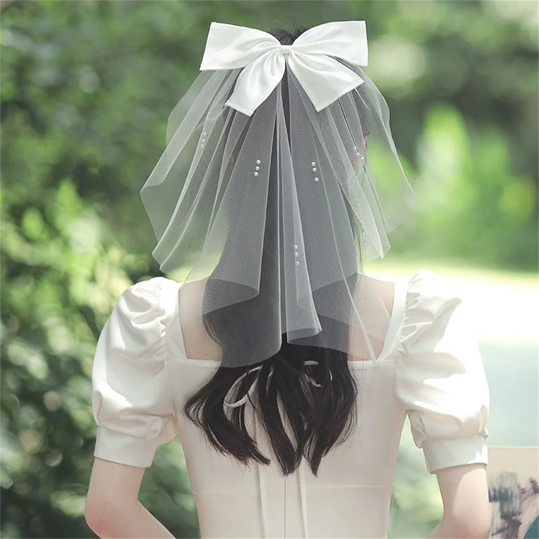 The bow veil bride is decorated with fairy forests, and the photo props are licensed for travel photography
The bow veil bride is decorated with fairy forests, and the photo props are licensed for travel photography