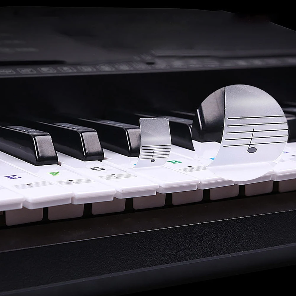 Piano Keyboard Sticker 1pc 22.7 * 24.6cm Beginner For 88/61/54/49/37Key Keyboard Stickers Note PVC Transparent
Piano Keyboard Sticker 1pc 22.7 * 24.6cm Beginner For 88/61/54/49/37Key Keyboard Stickers Note PVC Transparent