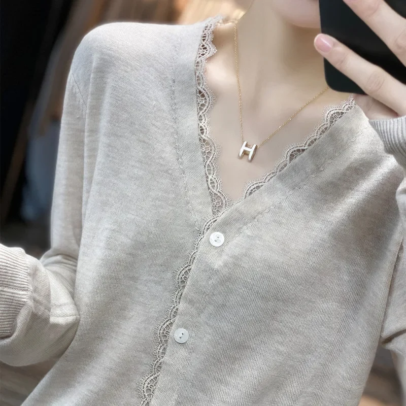 Elegant V-neck Lace Micro-permeable Thin Wool Knit Cardigan Women Spring and Autumn Loose Cashmere Coat
Elegant V-neck Lace Micro-permeable Thin Wool Knit Cardigan Women Spring and Autumn Loose Cashmere Coat