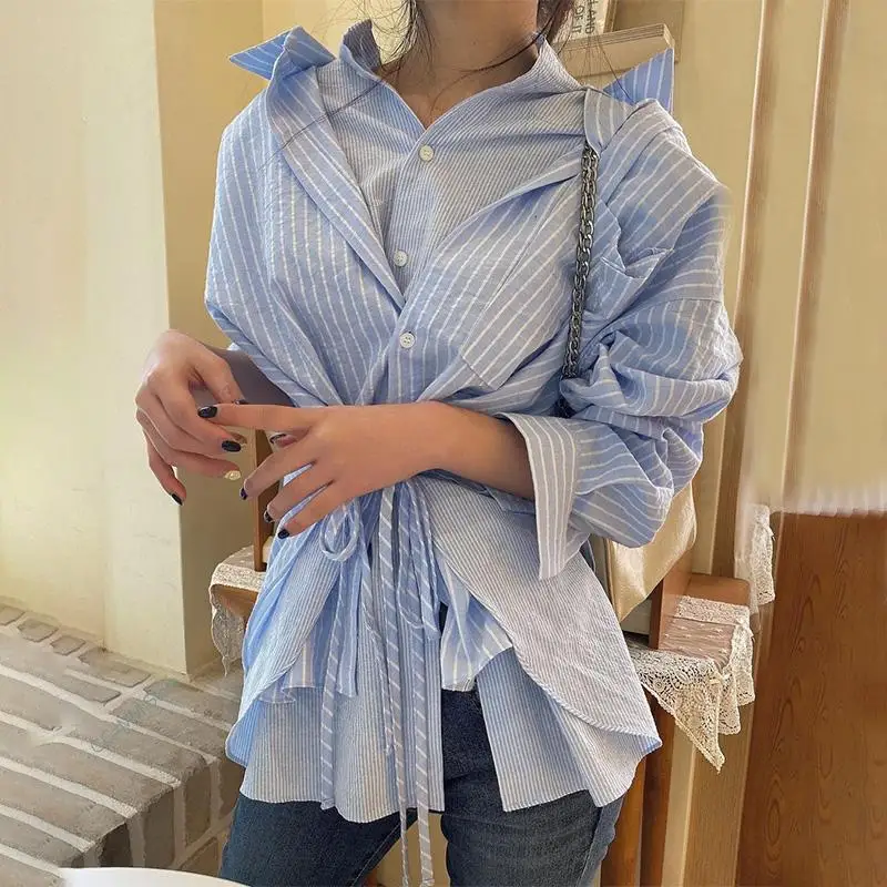 2022 Autumn Women Casual Single Breasted Turn-down Collar Asymmetrical Patchwork Long-sleeved Striped Lace Up Blouse
2022 Autumn Women Casual Single Breasted Turn-down Collar Asymmetrical Patchwork Long-sleeved Striped Lace Up Blouse