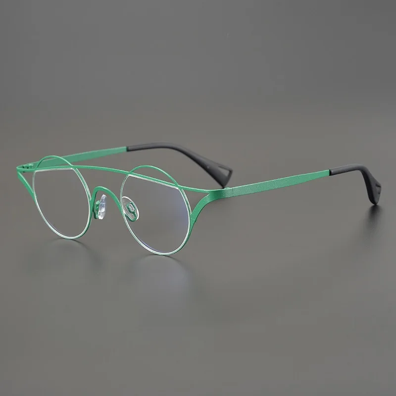 Designer pure titanium cat-eye frames for men and women Fashion personality metal optical frames make prescription glasses
Designer pure titanium cat-eye frames for men and women Fashion personality metal optical frames make prescription glasses