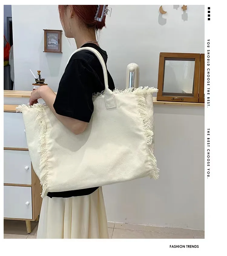 Trend niche design canvas tassel tote bag high-end fashion simple shoulder bag large capacity commuting versatile shoulder bag
Trend niche design canvas tassel tote bag high-end fashion simple shoulder bag large capacity commuting versatile shoulder bag