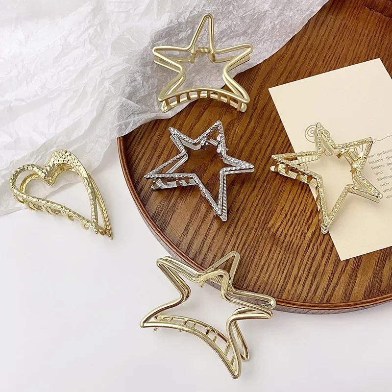 Korean Five-pointed Star Hairpin Small Heart-shaped Shark Hair Clip Metal Frosted Hollow Hair Claw
Korean Five-pointed Star Hairpin Small Heart-shaped Shark Hair Clip Metal Frosted Hollow Hair Claw