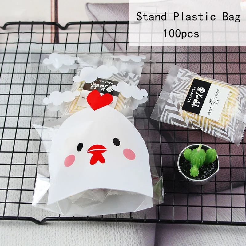 100pcs Small Chicken Self-adhesive Plastic Bags Stand Style Chocolate Cookie Bag Christmas Gift Bags Wedding Party Candy Package
100pcs Small Chicken Self-adhesive Plastic Bags Stand Style Chocolate Cookie Bag Christmas Gift Bags Wedding Party Candy Package