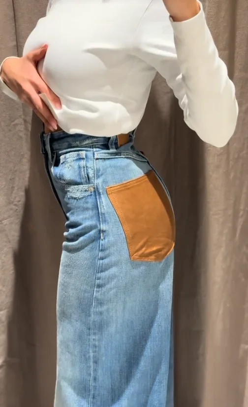 بنطلون نسائي واسع الساق من الجلد الصناعي مع جيوب، خصر مرتفع، تصميم فضفاض، مناسب للارتداء اليومي والتنقل، أزياء الشارع، ربيع 2026 بنطلون نسائي واسع الساق من الجلد الصناعي مع جيوب، خصر مرتفع، تصميم فضفاض، مناسب للارتداء اليومي والتنقل، أزياء الشارع، ربيع 2026