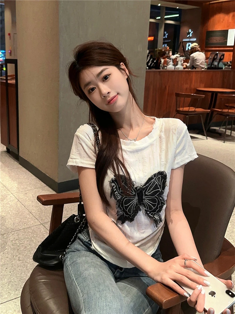 American retro women's tops butterfly y2k short-sleeved t-shirt women's shirt summer new women's ragged design Slim thin tops
American retro women's tops butterfly y2k short-sleeved t-shirt women's shirt summer new women's ragged design Slim thin tops