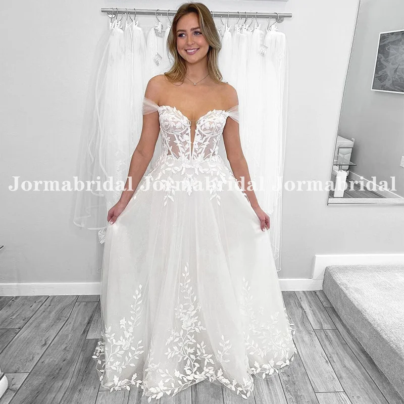 Glamorous A-line Wedding Dress with Plunging V-neck Sheer Corset Bodice Embellished with Appliqués Off the Shoulder Bridal Gowns
Glamorous A-line Wedding Dress with Plunging V-neck Sheer Corset Bodice Embellished with Appliqués Off the Shoulder Bridal Gowns