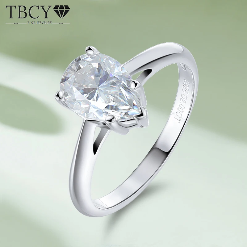 TBCYD 2CT Pear Cut Moissanite Ring For Women 925 Sterling Silver Water Drop Diamond Solitaire Ring Wedding Band Fine Jewelry
TBCYD 2CT Pear Cut Moissanite Ring For Women 925 Sterling Silver Water Drop Diamond Solitaire Ring Wedding Band Fine Jewelry