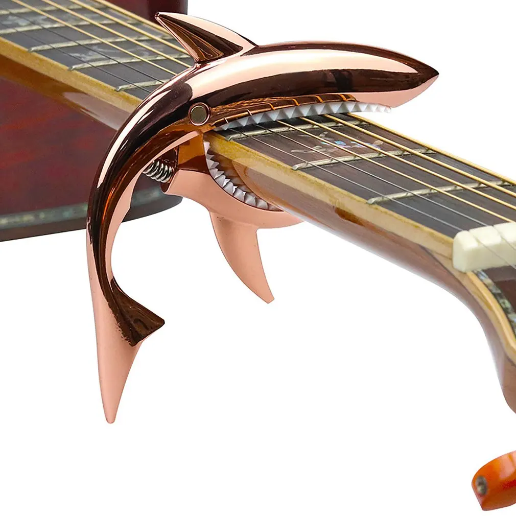 Guitar Shark Capo Zinc Alloy Adjustable Quick Change Clip Bass Guitar Bridge Guitar Stringed Instrument Accessories
Guitar Shark Capo Zinc Alloy Adjustable Quick Change Clip Bass Guitar Bridge Guitar Stringed Instrument Accessories