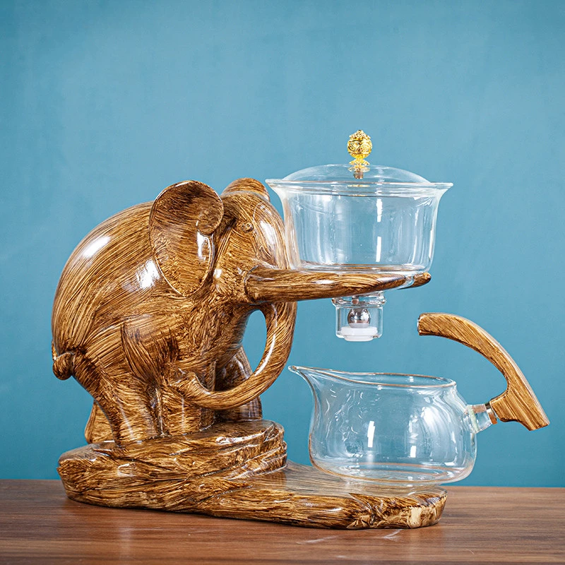 Creative Tea Set Elephant Shape Automatic Tea Set Pu'er Oolong Teapot And Cup Set Heat-resistant Glass Teapot With Base
Creative Tea Set Elephant Shape Automatic Tea Set Pu'er Oolong Teapot And Cup Set Heat-resistant Glass Teapot With Base