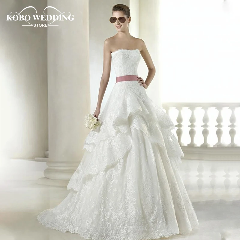 Princess Wedding Dress Lace Ball Gown Wedding Dresses Pink Sash Wedding Gown Strapless Layers
Princess Wedding Dress Lace Ball Gown Wedding Dresses Pink Sash Wedding Gown Strapless Layers