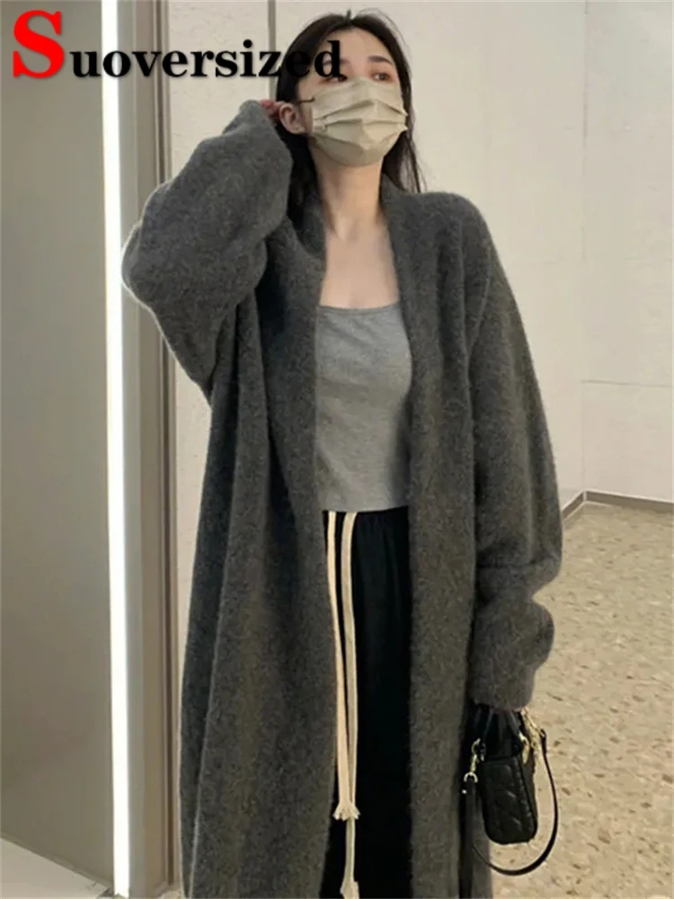 Loose Knitted Mid-length Cardigan Long Sleeve Spring Fall Knitwear Jacket Women Korean Casual Sweater Thick Elegant Coats
Loose Knitted Mid-length Cardigan Long Sleeve Spring Fall Knitwear Jacket Women Korean Casual Sweater Thick Elegant Coats