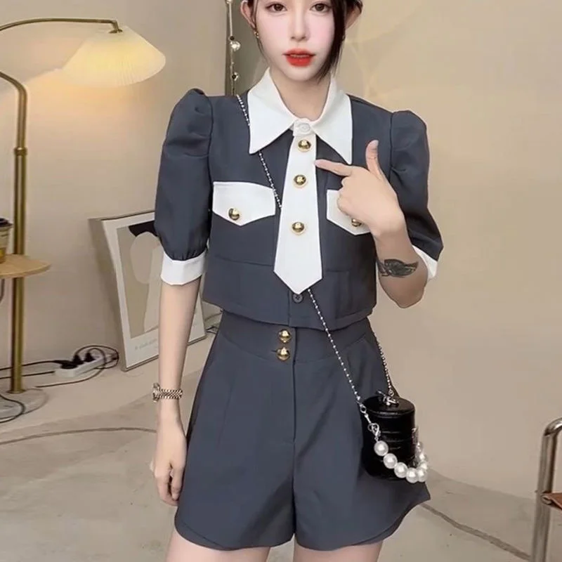College Style Suit Set 2022 Summer Vacation Short Suit Shirts High Waist Wide Leg Shorts Two Women's Sets Fashion Factory
College Style Suit Set 2022 Summer Vacation Short Suit Shirts High Waist Wide Leg Shorts Two Women's Sets Fashion Factory