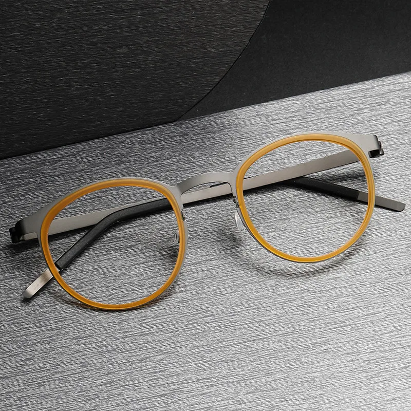 2022 New Vintage Eyeglass Frame 9704 TR-Pure Titanium Screw-less Design Classical Round Myopia Optical Glasses Original Quality
2022 New Vintage Eyeglass Frame 9704 TR-Pure Titanium Screw-less Design Classical Round Myopia Optical Glasses Original Quality