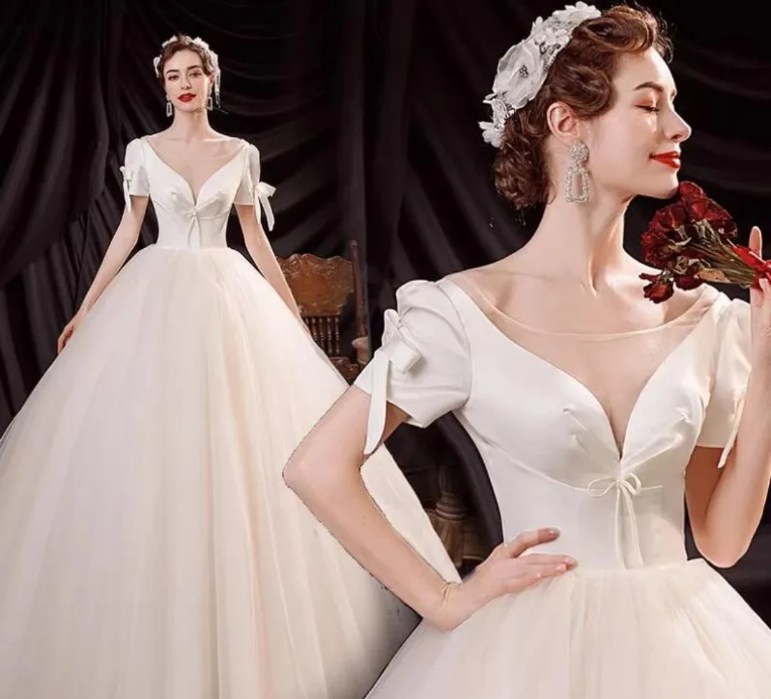 Elegant princess wedding dress satin short sleeve invisible round neck sexy halter tulle skirt and floor luxury bridal custom
Elegant princess wedding dress satin short sleeve invisible round neck sexy halter tulle skirt and floor luxury bridal custom