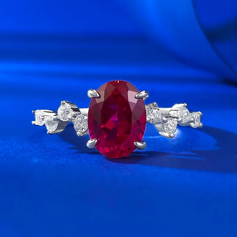 

Live Streaming New S925 Silver Simulation Pigeon Blood Red 6 * 8mm Oval Red Corundum Fashionable and Simple Ring