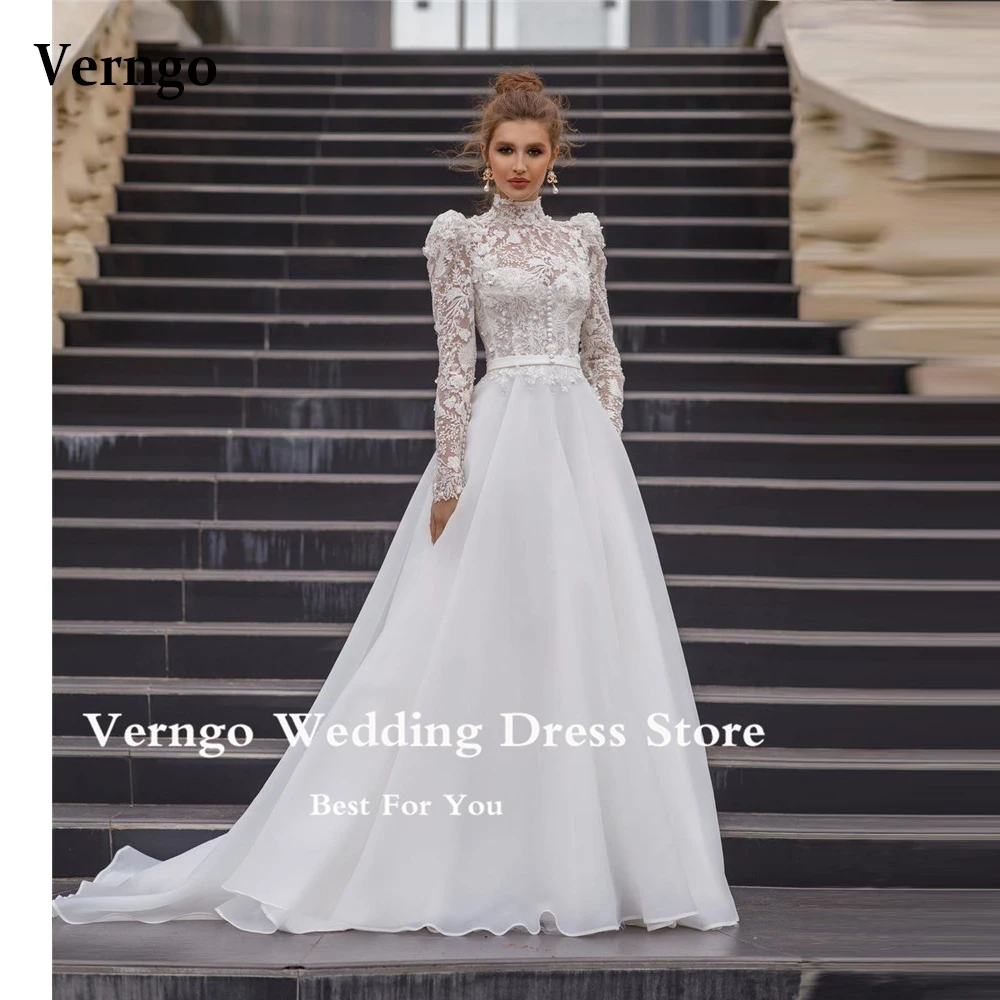 Verngo Modest A Line High Neck Lace 3D Flowers Organza Wedding Dresses Long Sleeves Buttons Neck Bridal Gowns Robe de mariage
Verngo Modest A Line High Neck Lace 3D Flowers Organza Wedding Dresses Long Sleeves Buttons Neck Bridal Gowns Robe de mariage