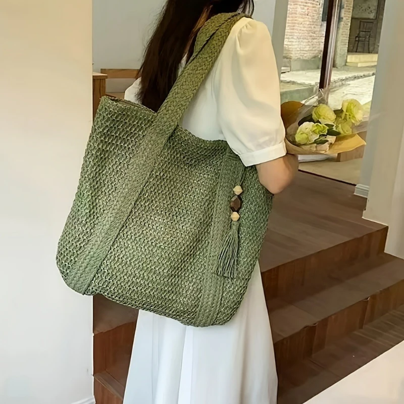 2024 Summer Woven Shoulder Bag Forest Casual Peach Wood Tassel Woven Bag Fashion Beach Large Capacity Grass Woven Handbag
2024 Summer Woven Shoulder Bag Forest Casual Peach Wood Tassel Woven Bag Fashion Beach Large Capacity Grass Woven Handbag