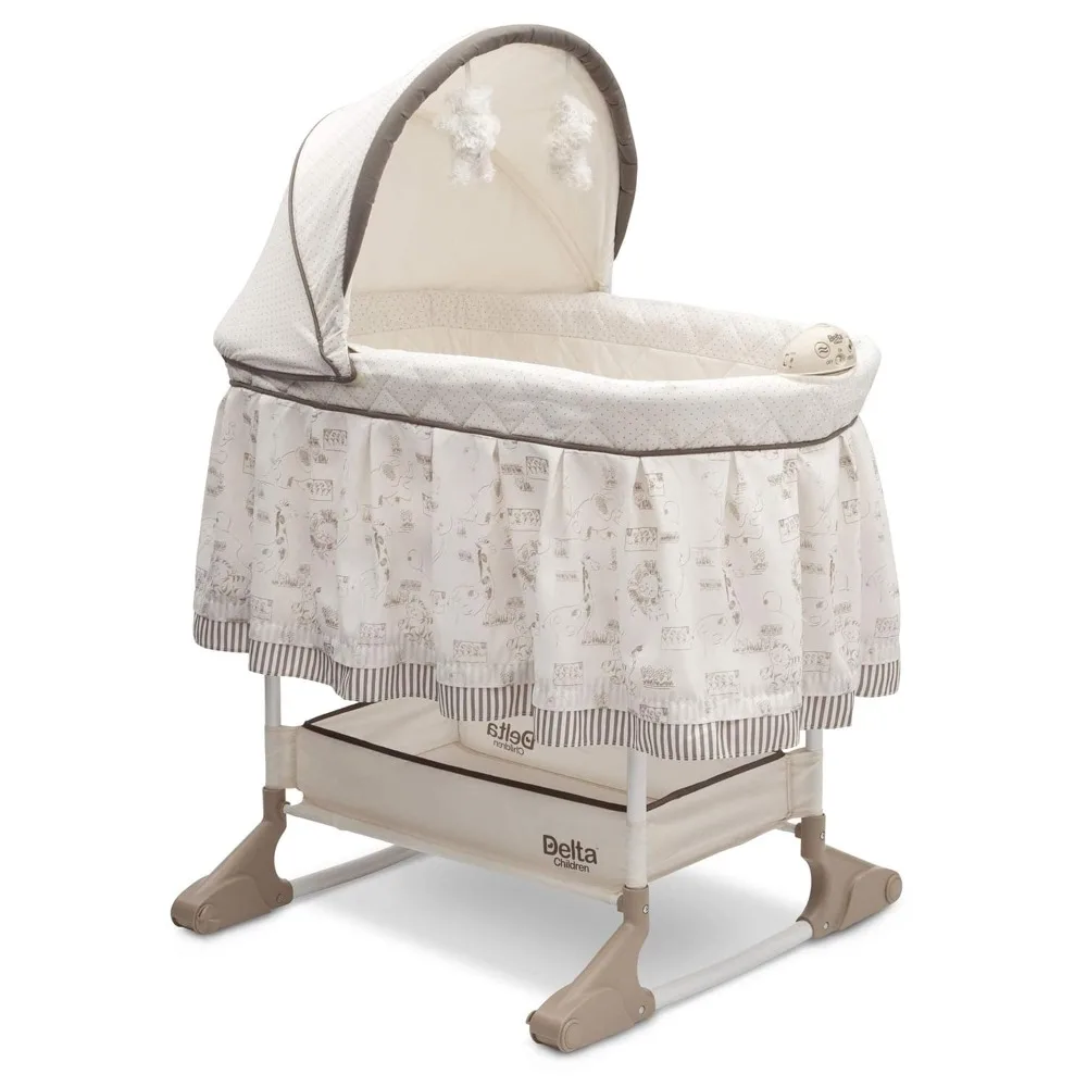 Delta Children Rocking Bedside Bassinet - Portable Crib with Lights Sounds and Vibrations, Play Time Jungle
Delta Children Rocking Bedside Bassinet - Portable Crib with Lights Sounds and Vibrations, Play Time Jungle