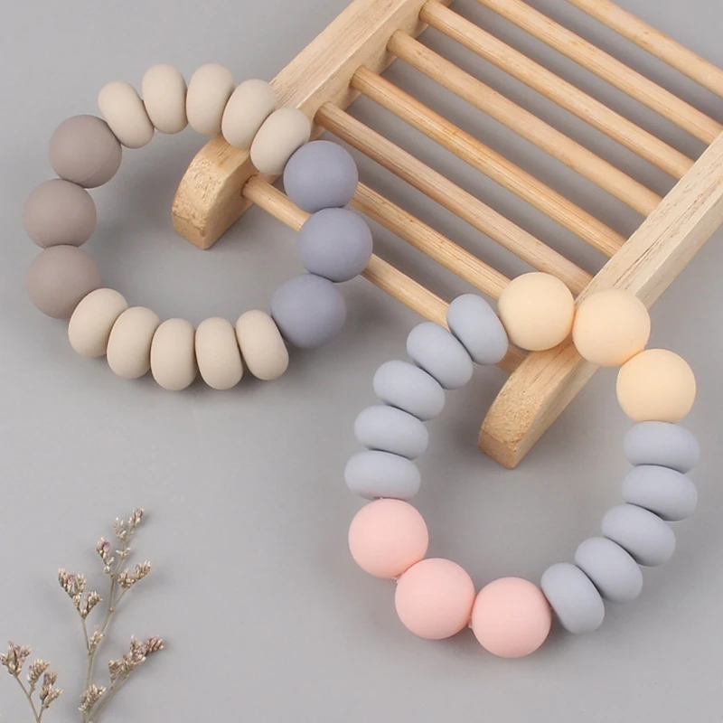 Breast Feeding Weaning Toy for Infants 0-6 Months Baby Silicone Bracelet Teething Toys BPA Free Infant Supplies Toy Dropshipping
Breast Feeding Weaning Toy for Infants 0-6 Months Baby Silicone Bracelet Teething Toys BPA Free Infant Supplies Toy Dropshipping