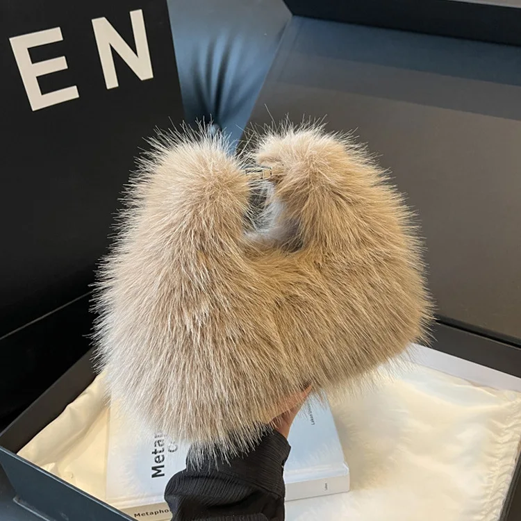 

Autumn and winter explosive small plush female 2023 new popular 100 oblique cross single shoulder hand hairy bag