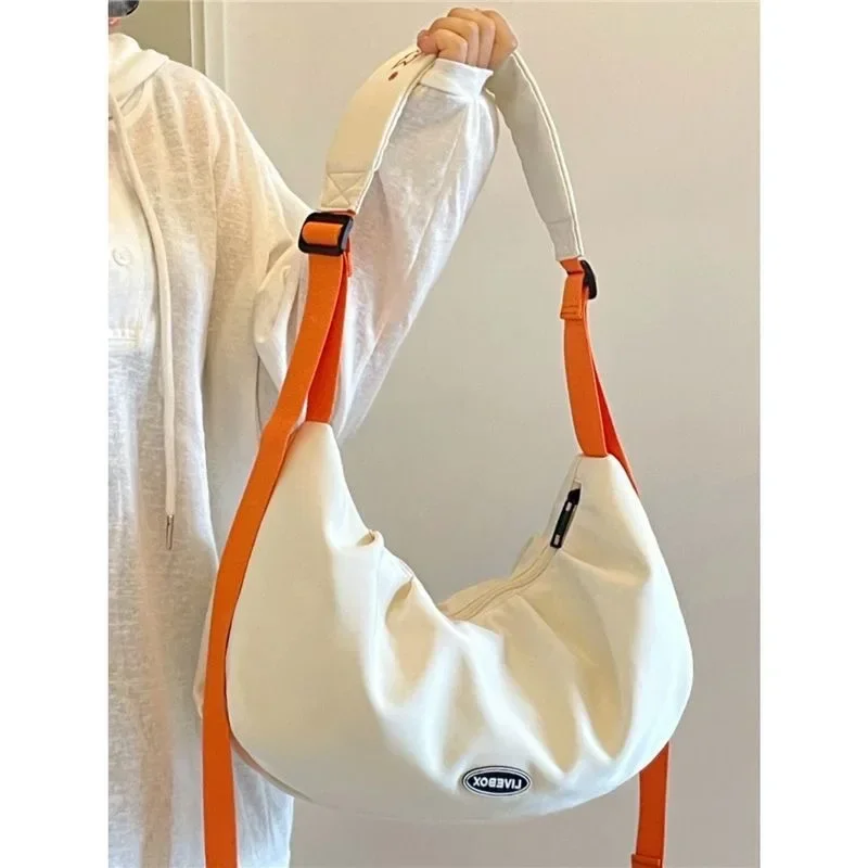 Nylon Dumpling Large Capacity Women Trendy Lightweight Shoulder Handbag Armpit Simple Canvas Bags For Women
Nylon Dumpling Large Capacity Women Trendy Lightweight Shoulder Handbag Armpit Simple Canvas Bags For Women