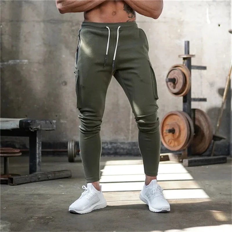 

Men Overalls Gyms Fitness Joggers Skinny Pants Men Casual Trousers Male Fitness Workout Cotton Track Pants Autumn Sportswear