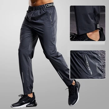 Calças Esportivas Masculinas de Primavera e Outono: Estilo e Conforto para Todas as Estações 7 Quick Drying Sport Pants Men Running Pants With Zipper Pockets Training Joggings Sports Trousers Fitness Casual Sweatpants