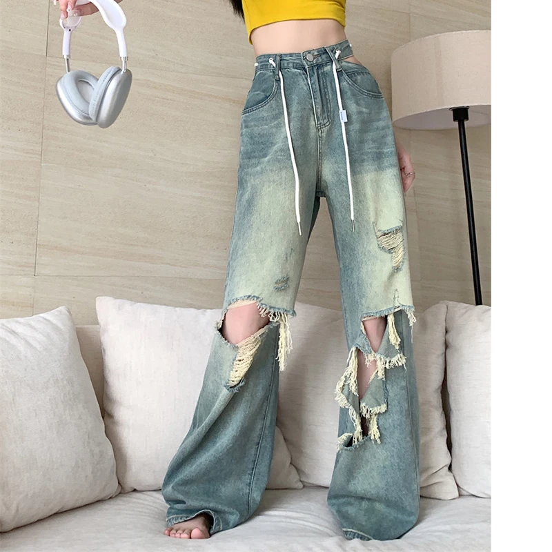 

Retro Women Jeans with Asymmetrical Hollowed Out Waist Drawstring High Waist Wid Leg Denim Pants Tassle Ripped Holes Jeans Girls