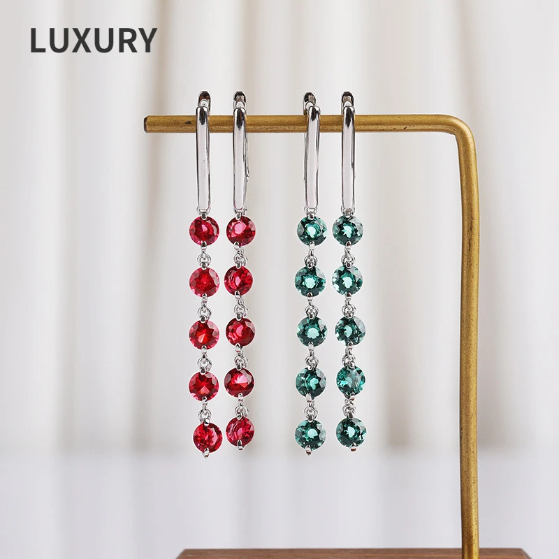 Женские длинные серьги из серебра 100% пробы, с инкрустированными синтетическими кристаллами
Женские длинные серьги из серебра 100% пробы, с инкрустированными синтетическими кристаллами