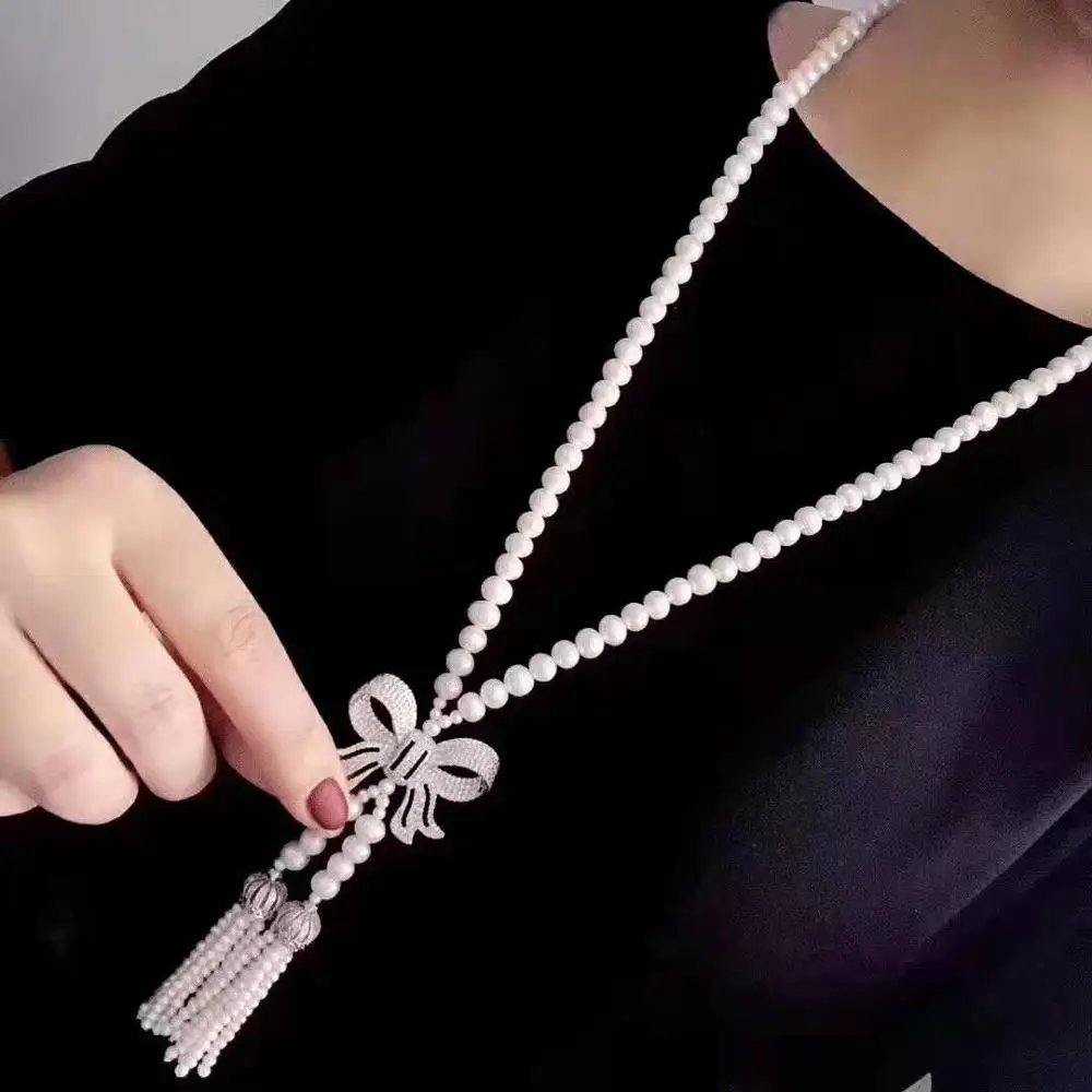 Women's fashion jewelry micro inlaid zircon bow accessories 3-4-5-6-7-8-9mm freshwater pearl tassel pendant necklace
Women's fashion jewelry micro inlaid zircon bow accessories 3-4-5-6-7-8-9mm freshwater pearl tassel pendant necklace
