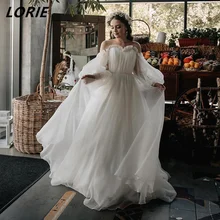 LORIE Bohemia Off Shoulder Tulle Wedding Dresses Puff Sleeves Backless A-Line Bridal Gowns Floor-Length Princess Bride Dress
LORIE Bohemia Off Shoulder Tulle Wedding Dresses Puff Sleeves Backless A-Line Bridal Gowns Floor-Length Princess Bride Dress
