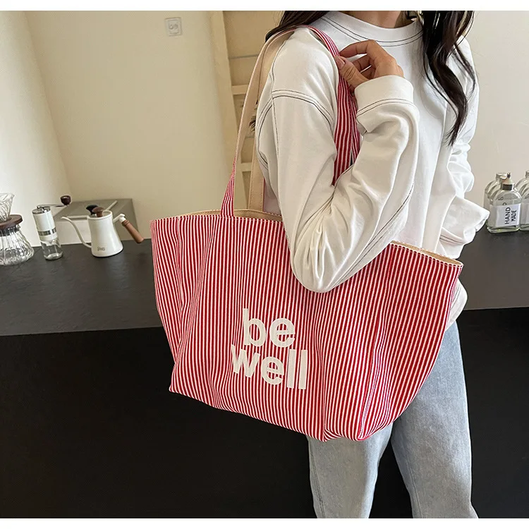 2025 New Fashion Striped Women's Shoulder Bag 17 S697300ba781f4ba6ac94c4c9332aac43h