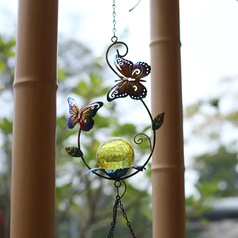 The courtyard is decorated with solar lamps, wind chimes hanging iron glowing landscape decoration
The courtyard is decorated with solar lamps, wind chimes hanging iron glowing landscape decoration