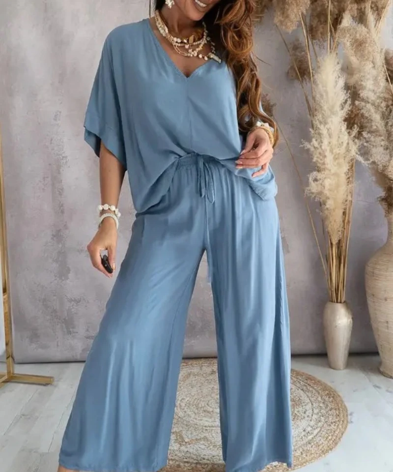 2023 Summer Spring Casual Woman Knit Sets Solid Color V-neck Short Sleeve Blouse Shirt Tops&Wide Leg Pants Sporty Two Piece Set
2023 Summer Spring Casual Woman Knit Sets Solid Color V-neck Short Sleeve Blouse Shirt Tops&Wide Leg Pants Sporty Two Piece Set