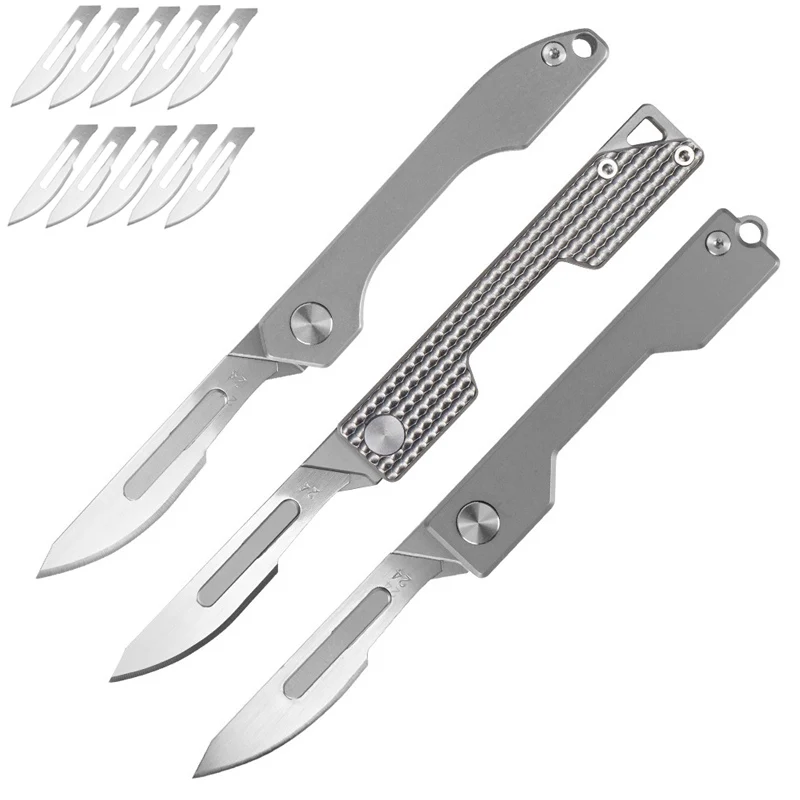 Mini Titanium Alloy Folding Scalpel with 10pcs Replaceable Blades Outdoor EDC Keychain Unpacking Pocket Knives Men Gift Box
Mini Titanium Alloy Folding Scalpel with 10pcs Replaceable Blades Outdoor EDC Keychain Unpacking Pocket Knives Men Gift Box