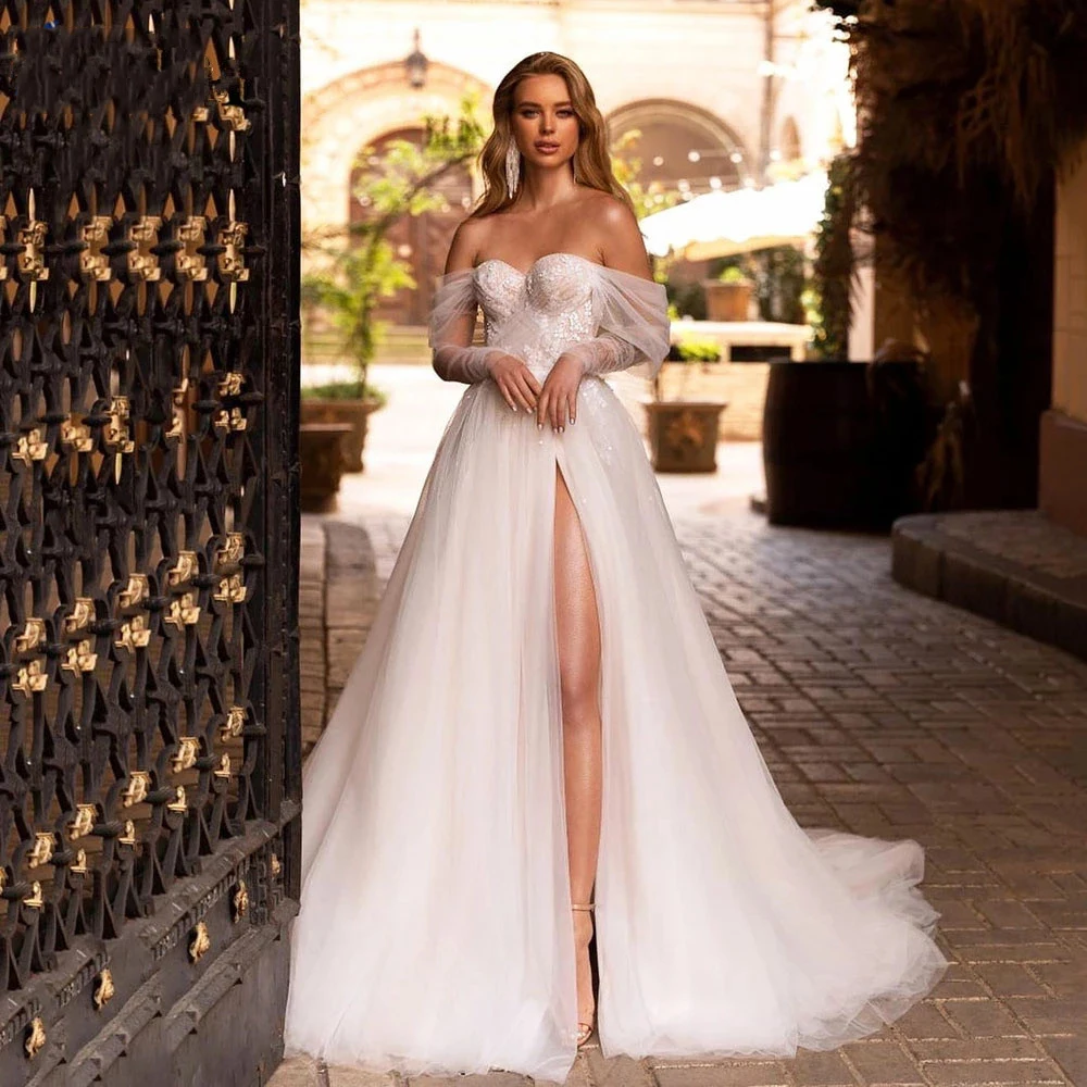 Lace Applique Sweet Wedding Dresses 2023Princess Off Shoulder Bohemia Beach Party Bridal Gowns Applique Split Back Noiva 2023
Lace Applique Sweet Wedding Dresses 2023Princess Off Shoulder Bohemia Beach Party Bridal Gowns Applique Split Back Noiva 2023