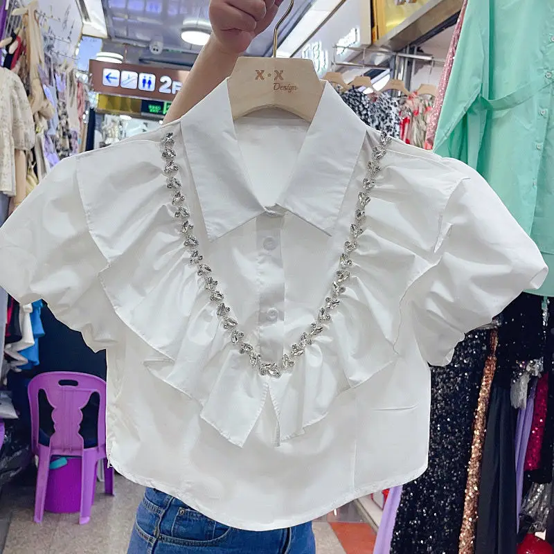 Turn Down Collar Ruffles Puff Sleeve Shirts Summer Vintage French Blusas Mujer De Moda 2023 Chic Buttons Diamonds Fairy Blouses
Turn Down Collar Ruffles Puff Sleeve Shirts Summer Vintage French Blusas Mujer De Moda 2023 Chic Buttons Diamonds Fairy Blouses