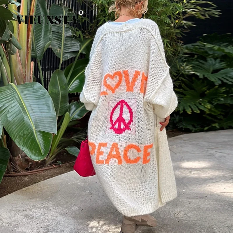 Fashion Jacquard Knitted Coats Letter Pattern Long Tops Female Loose Sweater Holiday Streetwear Women Casual Oversized Cardigan
Fashion Jacquard Knitted Coats Letter Pattern Long Tops Female Loose Sweater Holiday Streetwear Women Casual Oversized Cardigan