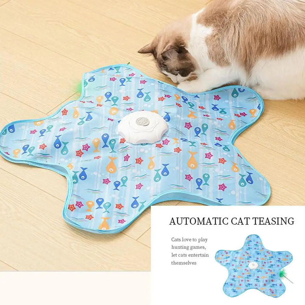 Indoor Cat Toy | Star-Shaped Automatic Cat Toys A bicolor cat sniffing the edge of the starfish toy. An inset box titled "AUTOMATIC CAT TEASING" explains how the toy helps cats entertain themselves through hunting games.