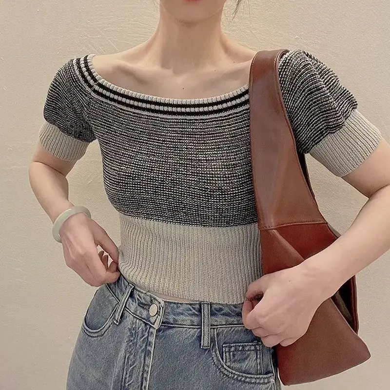 off shoulder exposed collarbone bubble sleeve knit shirt for women's summer and Korean slim fitting top trend
off shoulder exposed collarbone bubble sleeve knit shirt for women's summer and Korean slim fitting top trend
