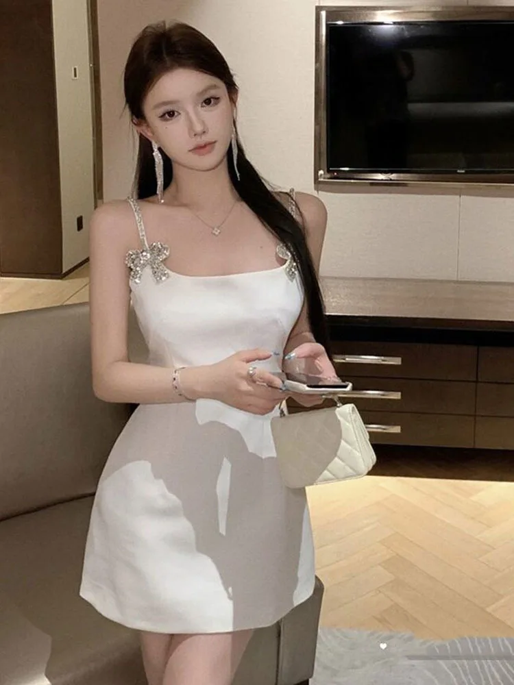Party Dress Woman Elegant Sleeveless Rhinestone Bowknot Slim Slash Neck Backless Sexy Elegant Mini Dresses Ladies Sweet
Party Dress Woman Elegant Sleeveless Rhinestone Bowknot Slim Slash Neck Backless Sexy Elegant Mini Dresses Ladies Sweet