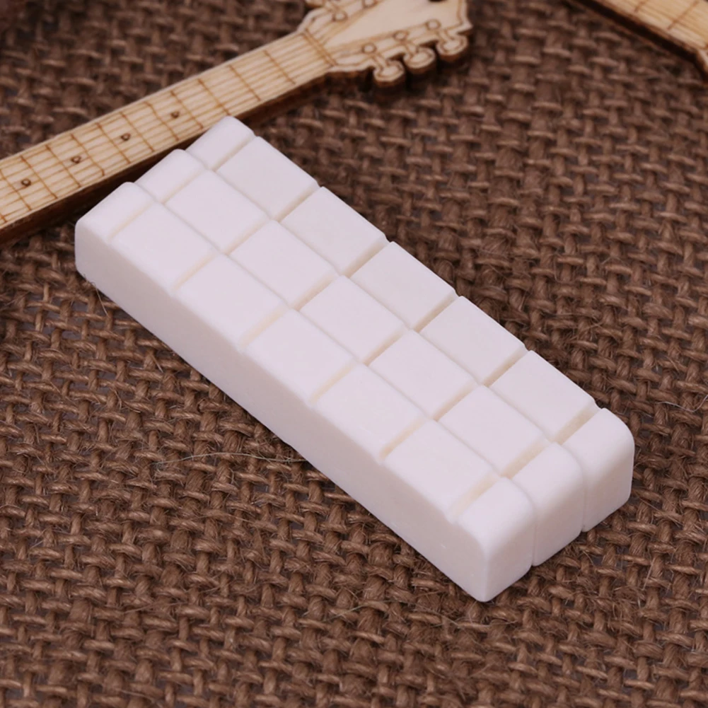 High Quality Guitar Nut Real Bone 6 String Bone Bridge Classical Guitar Guitar Saddle Parts Replacement Saddle
High Quality Guitar Nut Real Bone 6 String Bone Bridge Classical Guitar Guitar Saddle Parts Replacement Saddle