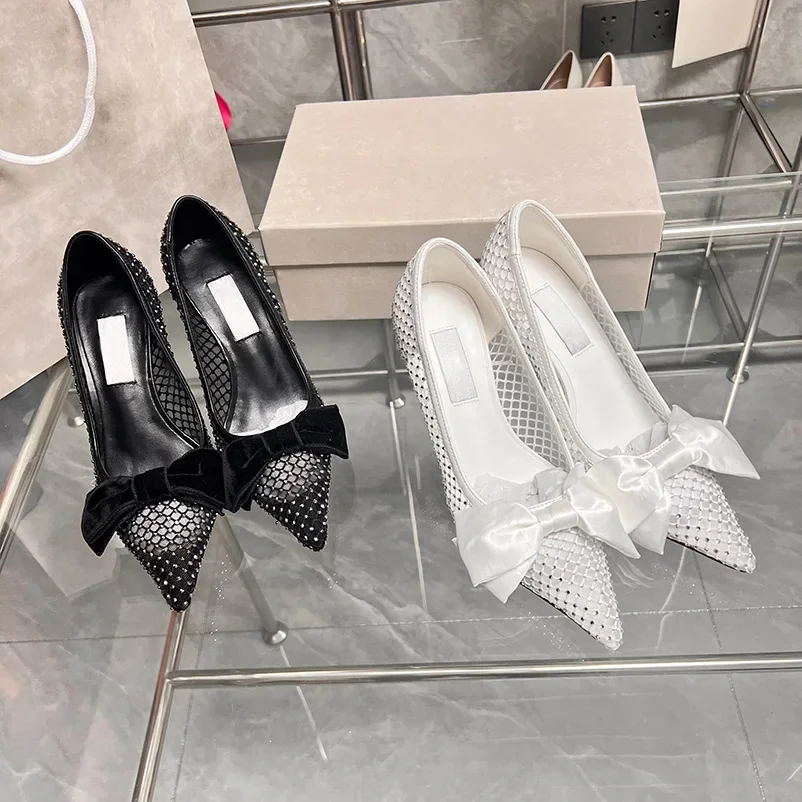23 Spring and summer new pointed head mesh diamond bow single shoes European and American fashion with stiletto pumps
23 Spring and summer new pointed head mesh diamond bow single shoes European and American fashion with stiletto pumps