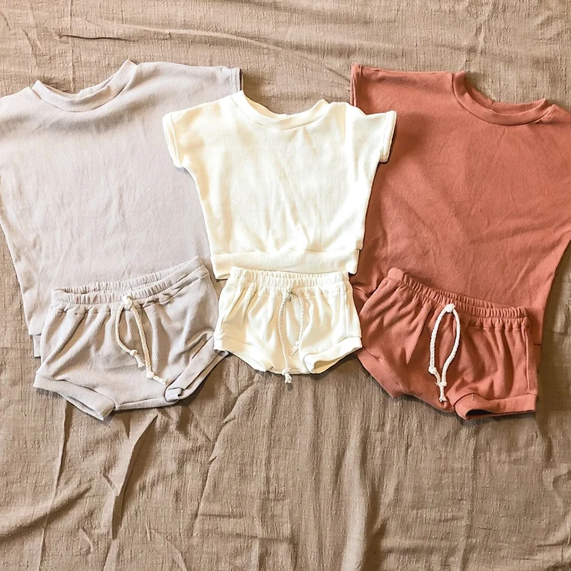 Casual Summer Baby Clothes Cotton Ribbed Short Sleeve Baby Boys Clothes Set 2pcs Solid Color Elastic Band Kids Clothing Set
Casual Summer Baby Clothes Cotton Ribbed Short Sleeve Baby Boys Clothes Set 2pcs Solid Color Elastic Band Kids Clothing Set